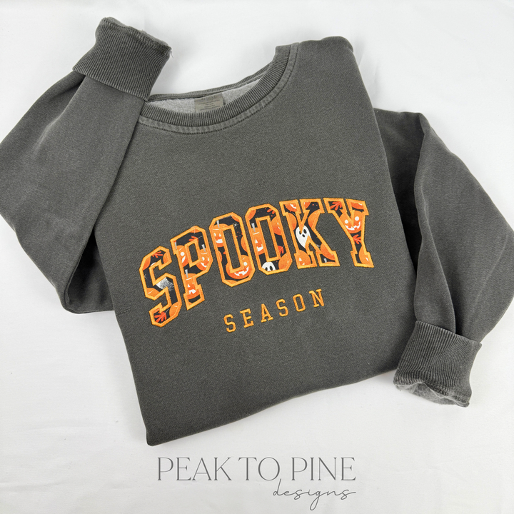 high quality stitched embroidered spooky season marquee letters with pumpkins and ghosts pattern sweatshirt hoodie crewneck