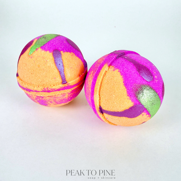 just peachy bath bomb with orange and pink, made with gentle ingredients for sensitive skin by peak to pine soap little things